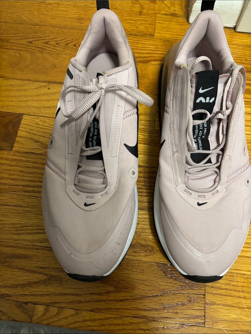 Nike Pink Low-Top Athletic Sneakers with Black Swoosh